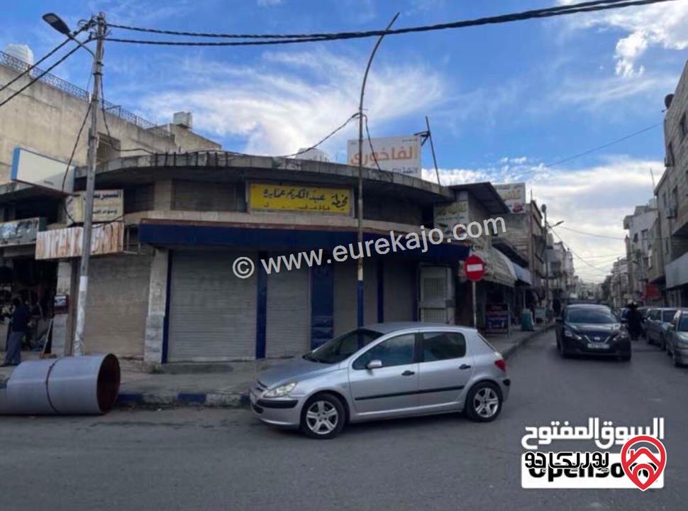 أرض ومحلات تجارية مساحة 460م مربع للبيع في اربد مقابل مجمع الغور القديم (قابل للتفاوض)