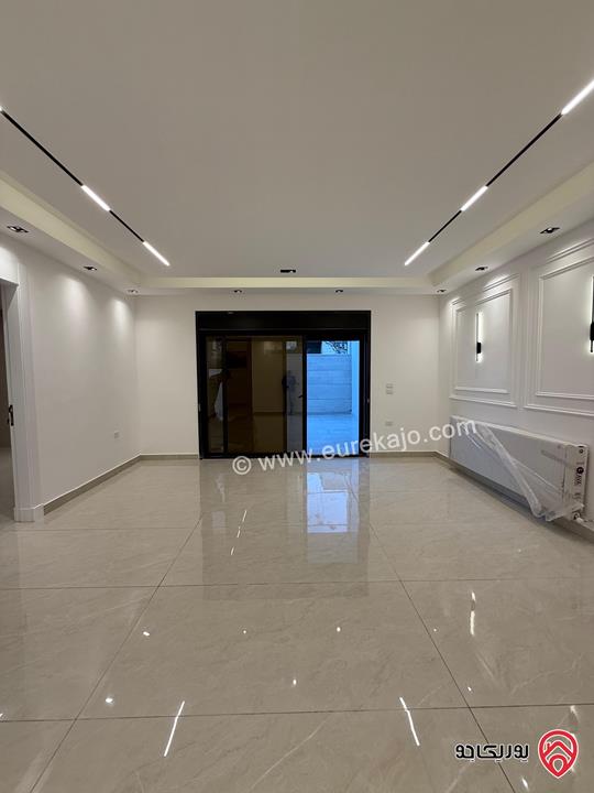 شقة طابق ارضي مساحة 227م مع ترس 60م سوبر ديلوكس للبيع في عمان - تلاع العلي