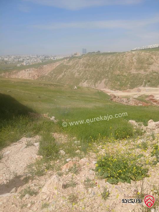 ارض مساحة 990م للبيع من أراضي غرب عمان - مرج الحمام البحاث الطبقة 