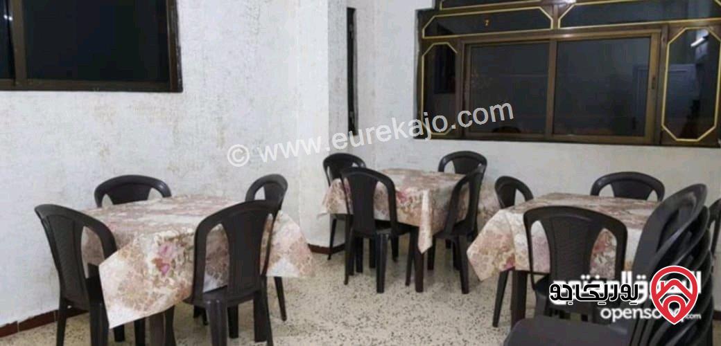 منزل قديم بطابقين تحته 4 محلات تجارية على أرض 365م للبيع في اربد