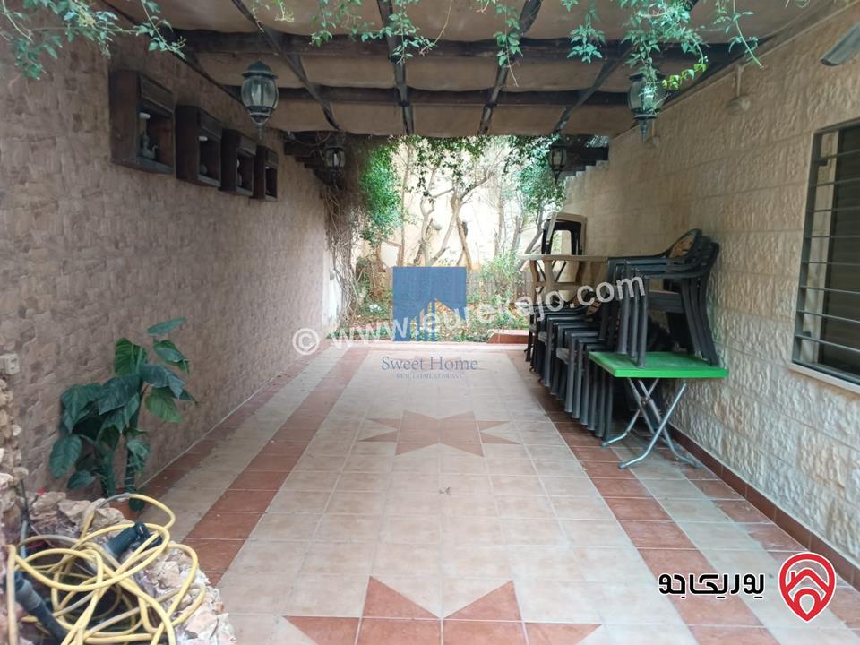 شقة أرضية مميزة مساحة 215م مع حديقة وترسات 120م للبيع في عمان - خلدا