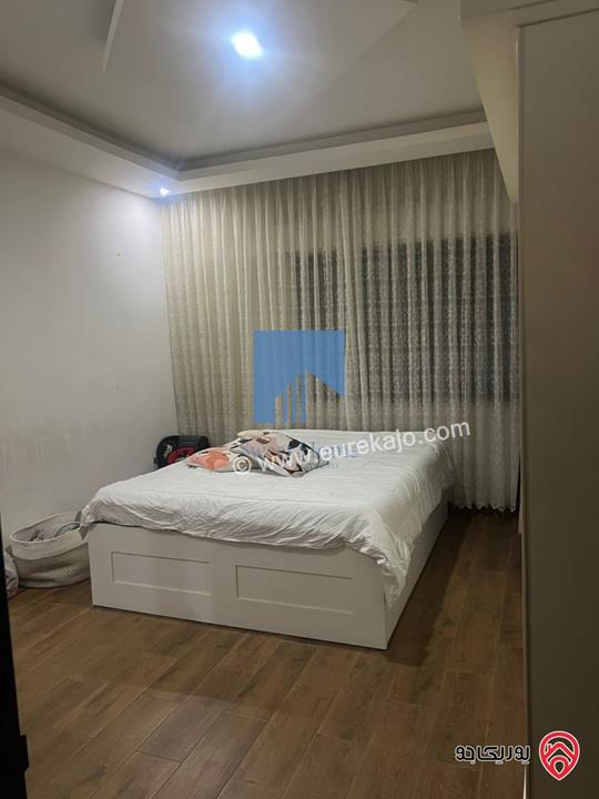 شقة أرضية مميزة للبيع في عمان - الجندويل قرب مركز أمن البيادر 180م مع حديقة وترسات 200م