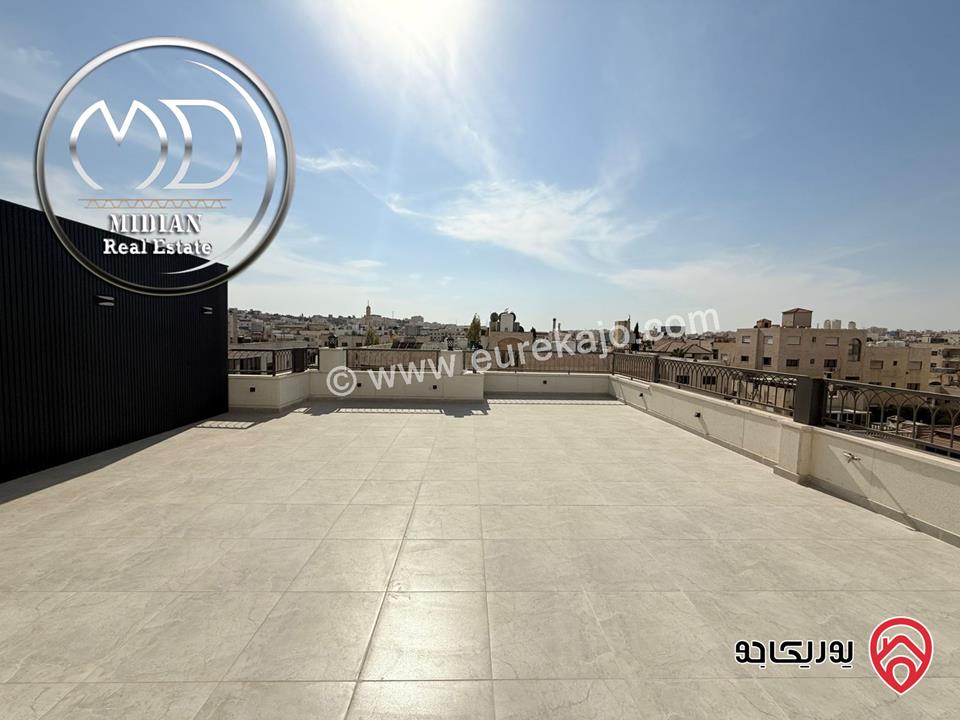 شقة دوبلكس طابق اخير مع روف للبيع في عمان - ضاحية النخيل مساحة 210م مع تراسات تشطيبات ديكورات عصرية فاخرة 