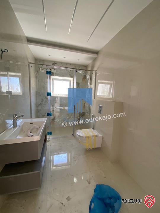 شقة فاخرة للبيع في عمان خلدا - قرب إشارة البنك العربي طابق ثالث 175م مع روف دوبلكس 120م لم تسكن