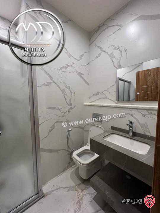 شقة أرضية للبيع في عمان - خلدا مساحة 185م مع ترس 40م تشطيبات سوبر ديلوكس جديدة لم تسكن بسعر مميز