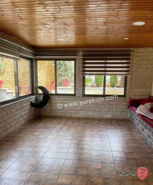 شقة مميزة مشمسة شبه ارضية مساحة 200م داخلي و 150م خارجي للايجار في عمان - خلدا 