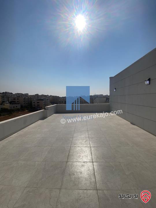 شقة فاخرة للبيع في عمان - خلدا قرب إشارة البنك العربي ومركز زها طابق ثالث 220م مع روف دوبلكس 100م لم تسكن