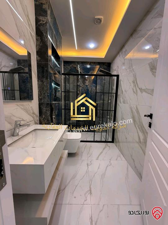 شقة جديدة لم تسكن طابق ارضي مساحة 160م داخلي و 100م خارجي للايجار في عمان - طريق المطار 