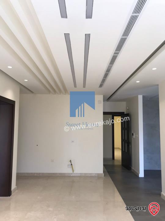 شقة طابقية فاخرة طابق اول مساحة 235م للبيع في عمان - الجندويل تشطيب سوبر ديلوكس لم تسكن