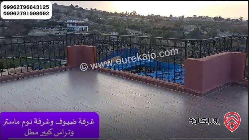 مزرعة مساحة الأرض 3500م والبناء طابقين دوبلكس 200م ومسبح للبيع في جرش - المصطبة