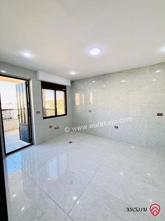 شقة طابق اخير مع روف مساحة 230م للبيع في عمان - شفا بدران اقساط 