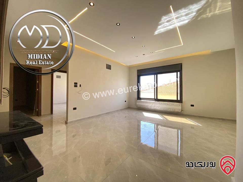 شقة ارضية جديدة للبيع في عمان - تلاع العلي مساحة 210م مع ترس و حديقة 140م تشطيبات ديكورات عصرية فاخرة بسعر مميز