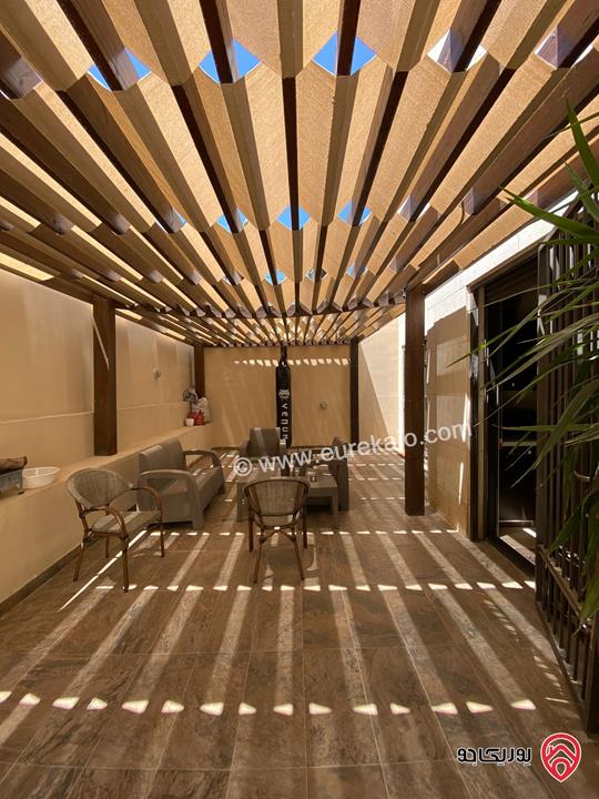 شقة طابق شبه ارضي مساحة 200م داخلي و 70م خارجي للبيع مفروشة في عمان - عبدون