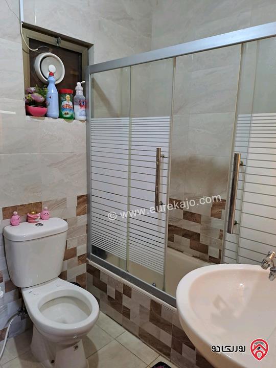 شقة طابق شبه ارضي مساحة 143م داخلي و 50م خارجي للبيع في عمان - أم نوارة