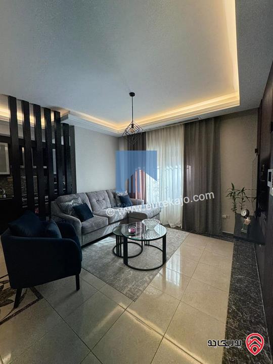 شقة مفروشة مساحة 94م مع ترس امامي 35م للبيع في عمان - ضاحية الأمير راشد