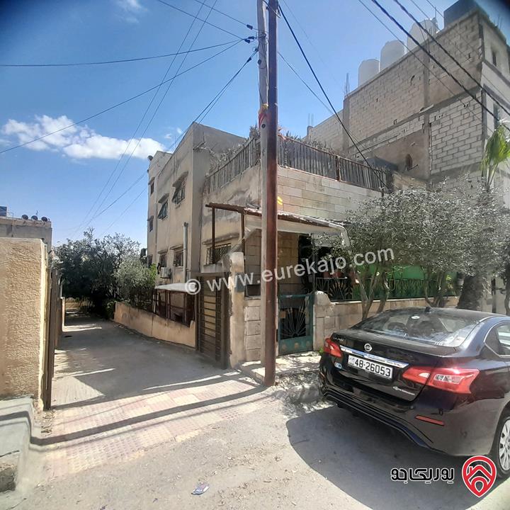 منزل مستقل ثلاث شقق طابقين وروف مساحة 270م على أرض 196م للبيع في عمان - ام نوارة