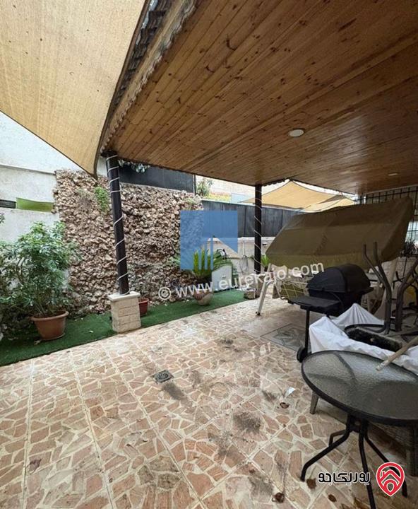 شقة أرضية مساحة 170م مع ترسات 120م للبيع في عمان - الرابية