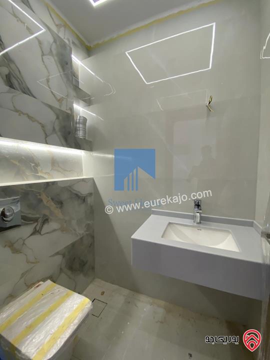 شقة أرضية فاخرة للبيع في عمان خلدا - قرب إشارة البنك العربي 175م مع ترسات 200م لم تسكن