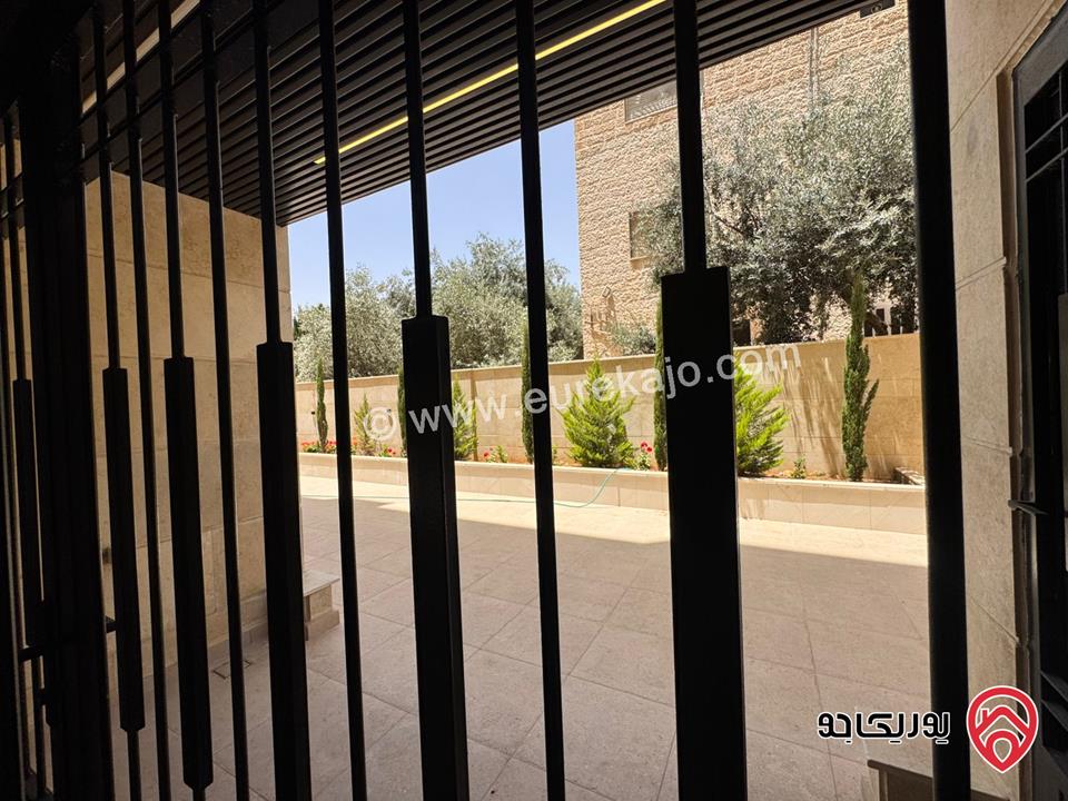 شقة للبيع في عمان - مرج الحمام / طريق المطار شبه ارضي مساحة البناء 225م ومساحة الحديقة 210م