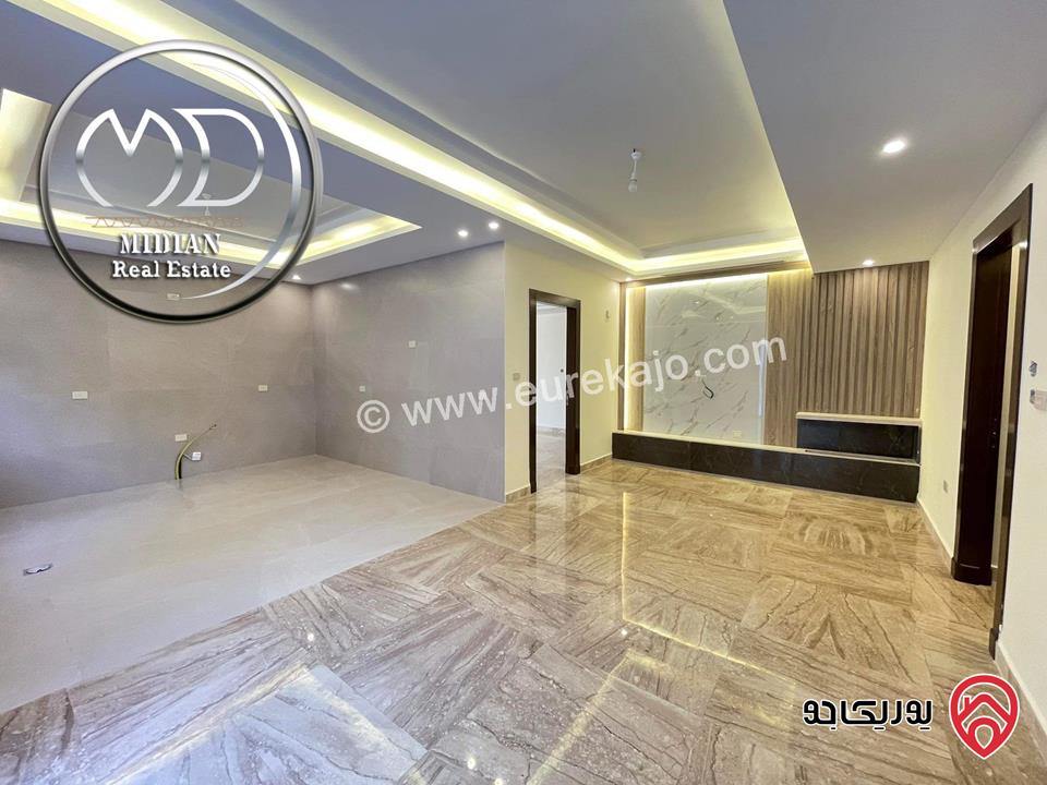 شقة شبه ارضي جديدة للبيع في عمان - ام السماق قرب الستي مول مساحة 160م مع ترس و حديقة 120م تشطيبات ديكورات فاخرة