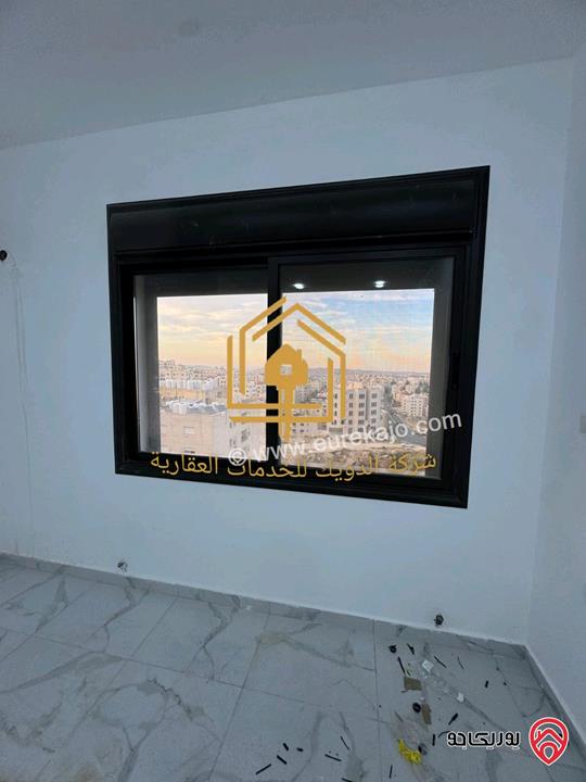 شقة جديدة طابق شبه ارضي مساحة 200م مع ترس 20م للايجار في عمان - ضاحية الرشيد 