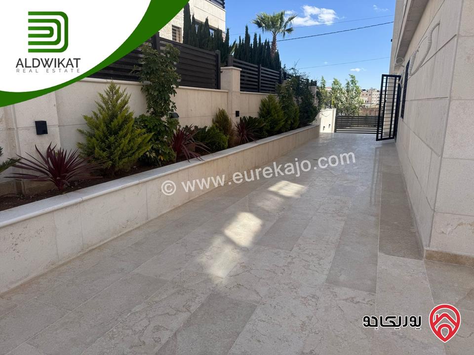 شقة ارضية للبيع في عمان - رجم عميش / طريق المطار مساحة البناء 210م ومساحة الحديقة 200م
