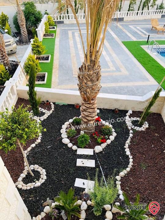 شاليه استثماري مميز مساحة الأرض 4 دونم و 500م والبناء 250م للبيع في المفرق - بلعما 