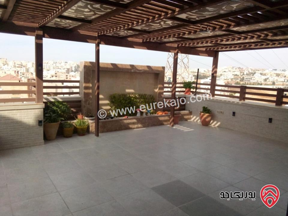 شقة طابق أخير مع روف مساحة 345م + ترس 60م للبيع في عمان - طريق المطار النخيل