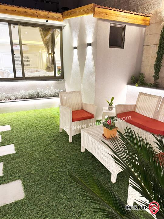 شقة شبه أرضية مساحة 135م داخلي مع حديقة 130م مفروشة بالكامل للايجار في عمان - عبدون