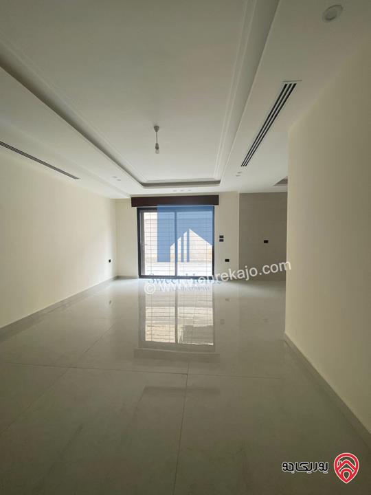 شقة شبه ارضية مساحة 175م مع ترسات 120م للبيع في عمان - الرابية