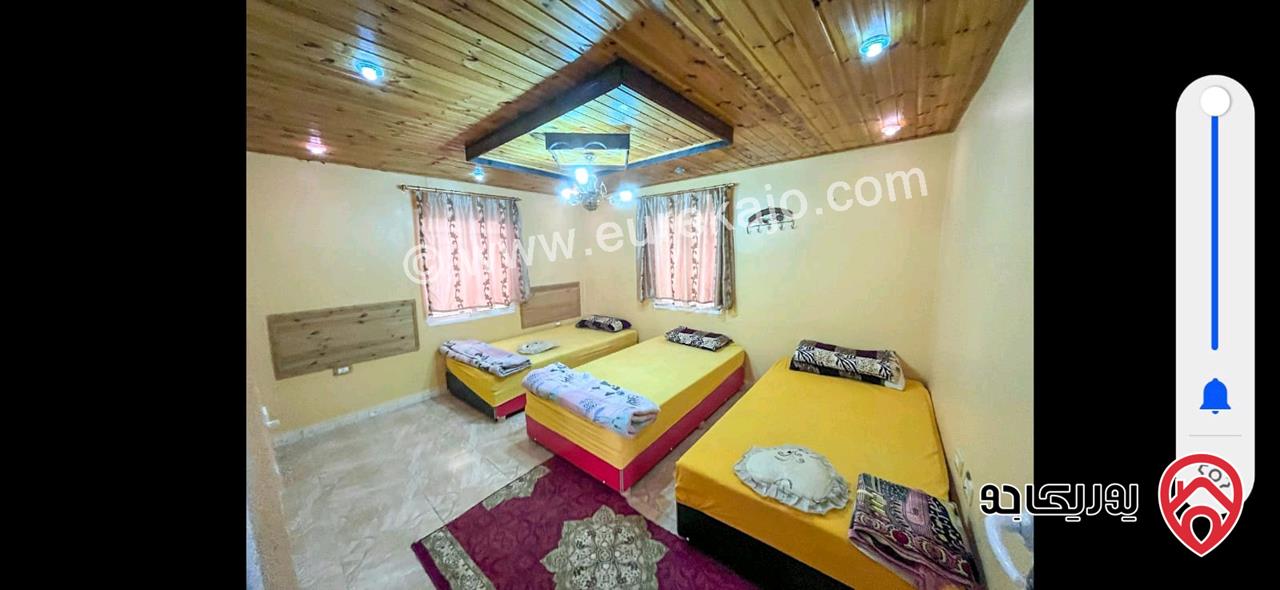 مزرعة ومنتجع مساحة الأرض 3 دونم و 700م والبناء 250م للبيع في اربد - كفر سوم قوشان مستقل استثمارية وسكنية