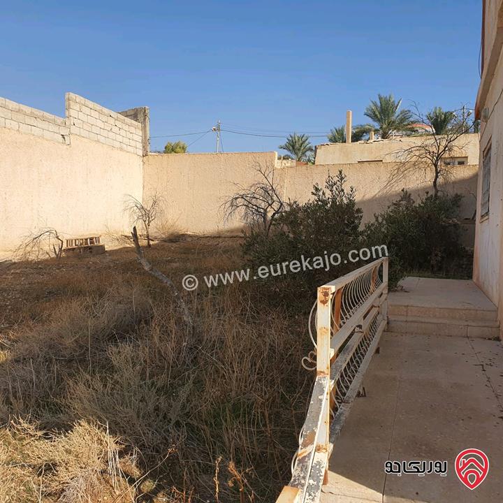 قطعة أرض مساحة 594م عليها بيت طابقين للبيع في البحر الميت جوفة الكفرين 