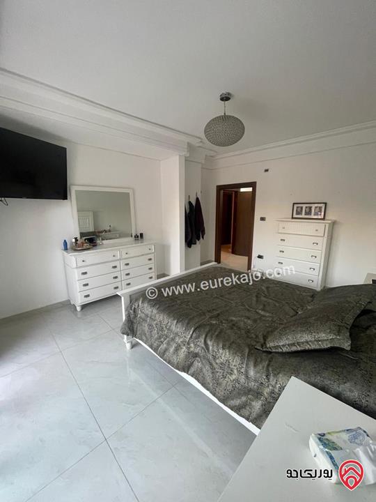 شقة شبه أرضية مساحة 245م داخلي و 250م خارجي للبيع في عمان - عبدون