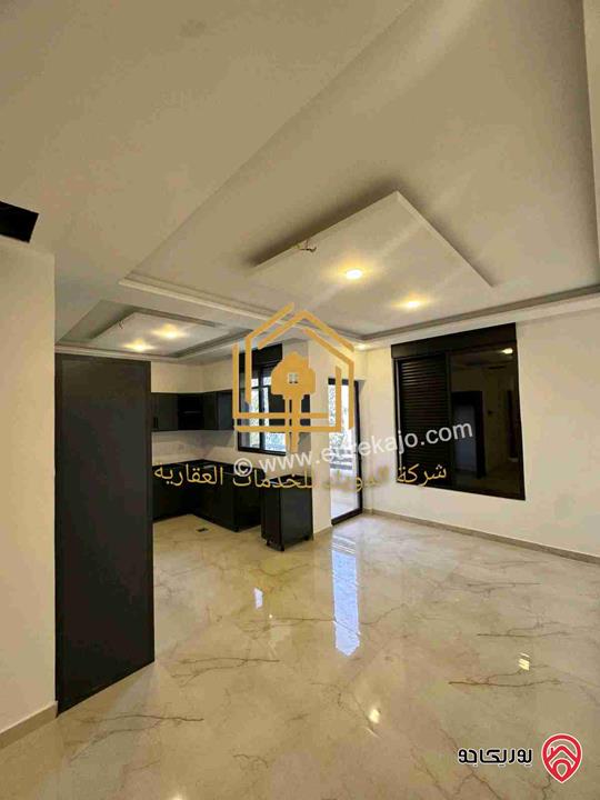شقة جديدة لم تسكن طابق اول مساحة 100م للإيجار في عمان - ضاحية الرشيد 