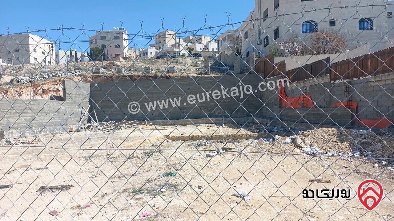 قطعة أرض مساحة 506م محفورة و مبني عليها جدران استنادية للبيع في عمان - ابو علندا ضاحية الفاروق اسكان الكهرباء