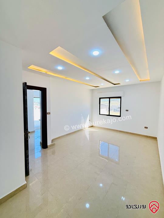 شقة طابق اخير مع روف مساحة 230م للبيع في عمان - شفا بدران اقساط 