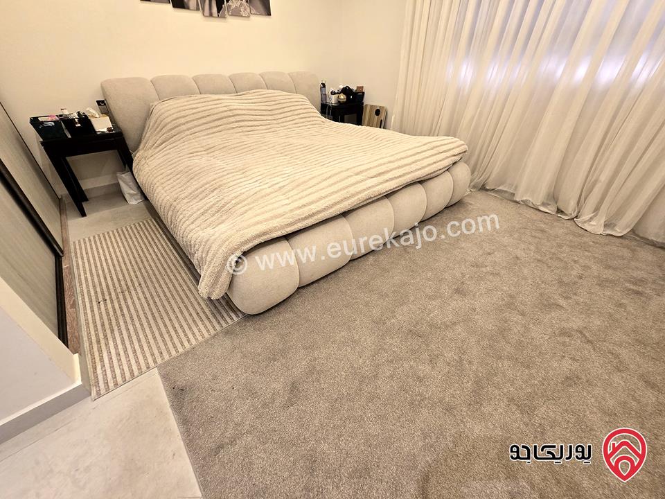 شقة مفروشة مساحة 230م مع حديقة كبيرة 300م و مدخل وكراج خاص للايجار في عمان - الرابية