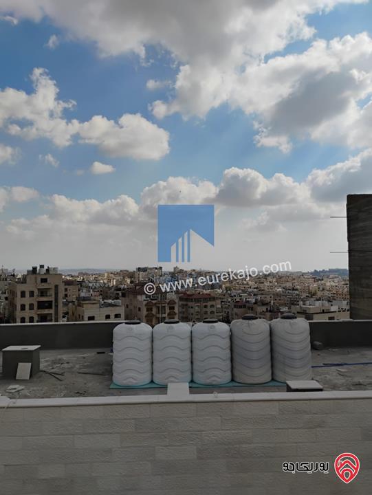شقة مميزة للبيع في عمان - خلدا قرب إشارة البنك العربي طابق ثالث 145م مع روف 60م بسعر مغري