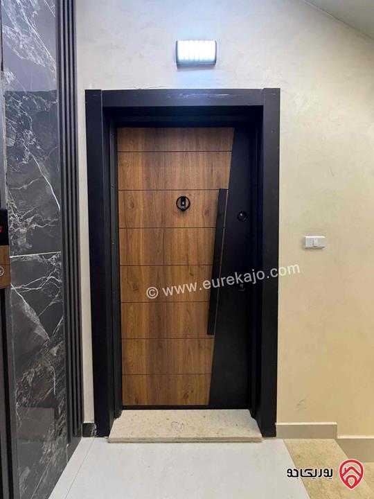 شقة طابق ثالث مع رووف مساحة 145م للبيع في عمان - الجبيهة