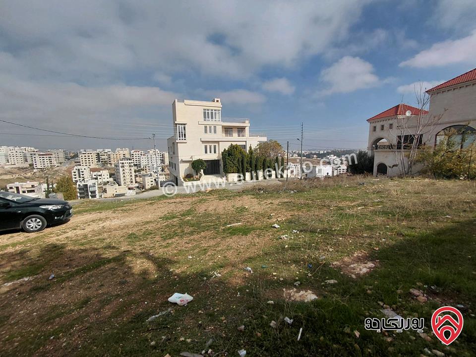قطعة ارض مميزة مساحة 945م سكن (أ) خاص ع شارعين للبيع في عمان - مرج الحمام طريق المطار خلف مدارس العالمية