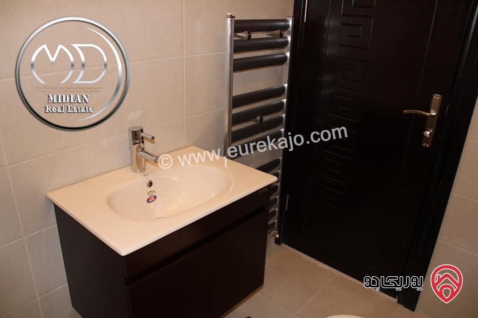 شقة ارضية جديدة للبيع في عمان - ضاحية النخيل مساحة 250م مع ترس و حديقة 150م تشطيبات و ديكورات سوبر ديلوكس