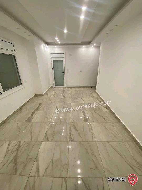 شقة فارغة طابق ثاني مساحة 90م للإيجار في عمان - الدوار السابع 