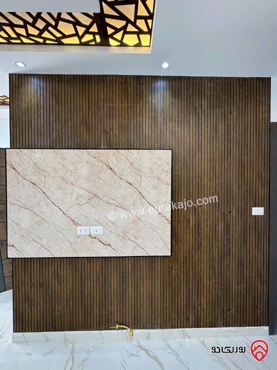 شقة بتشطيبات سوبر ديلوكس طابق أخير مع روف مساحة 175م للبيع في عمان - شفا بدران 