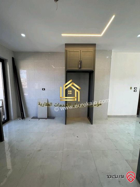 شقة جديدة لم تسكن طابق ارضي مساحة 125م للإيجار في عمان - مرج الحمام 