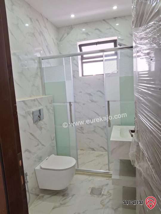 شقة جديدة طابق أول مساحة 170م للبيع في عمان - الرابية