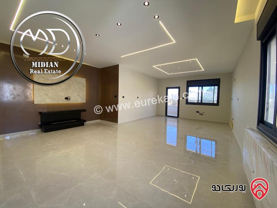 شقة ارضية جديدة للبيع في عمان - تلاع العلي مساحة 210م مع ترس و حديقة 140م تشطيبات ديكورات عصرية فاخرة بسعر مميز