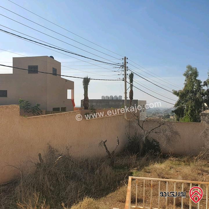 قطعة أرض مساحة 594م عليها بيت طابقين للبيع في البحر الميت جوفة الكفرين 