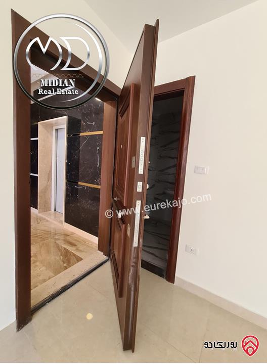 شقة أرضية جديدة للبيع في عمان - الدوار السابع مساحة 260م مع ترس و حديقة 200م تشطيبات سوبر ديلوكس بسعر مميز