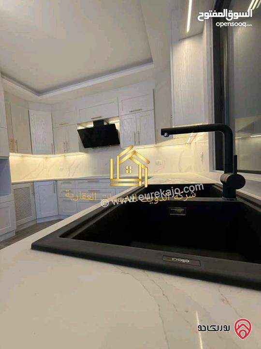 شقة جديدة دوبلكس ثالث مع روف مساحة 250م للإيجار في عمان - ضاحية النخيل 