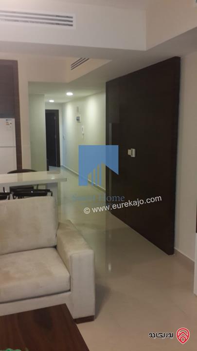 شقة أرضية مفروشة فاخرة للبيع في جبل عمان - مقابل رئاسة الوزراء وقرب فندق عمان ويست 100م مع ترسات 110م بسعر مغري